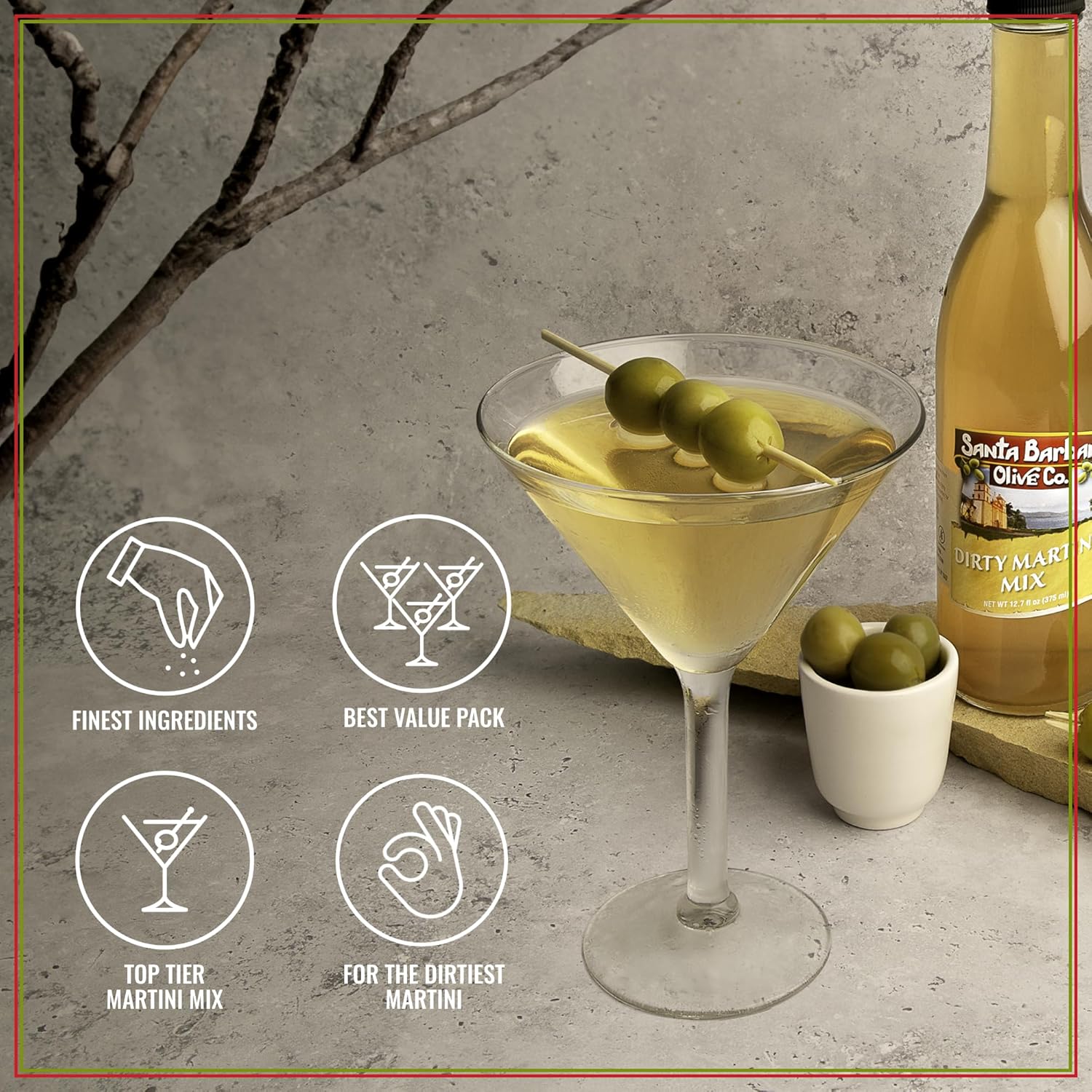 Martini glass with olives, bottle of Santa Barbara Olive Co. mix